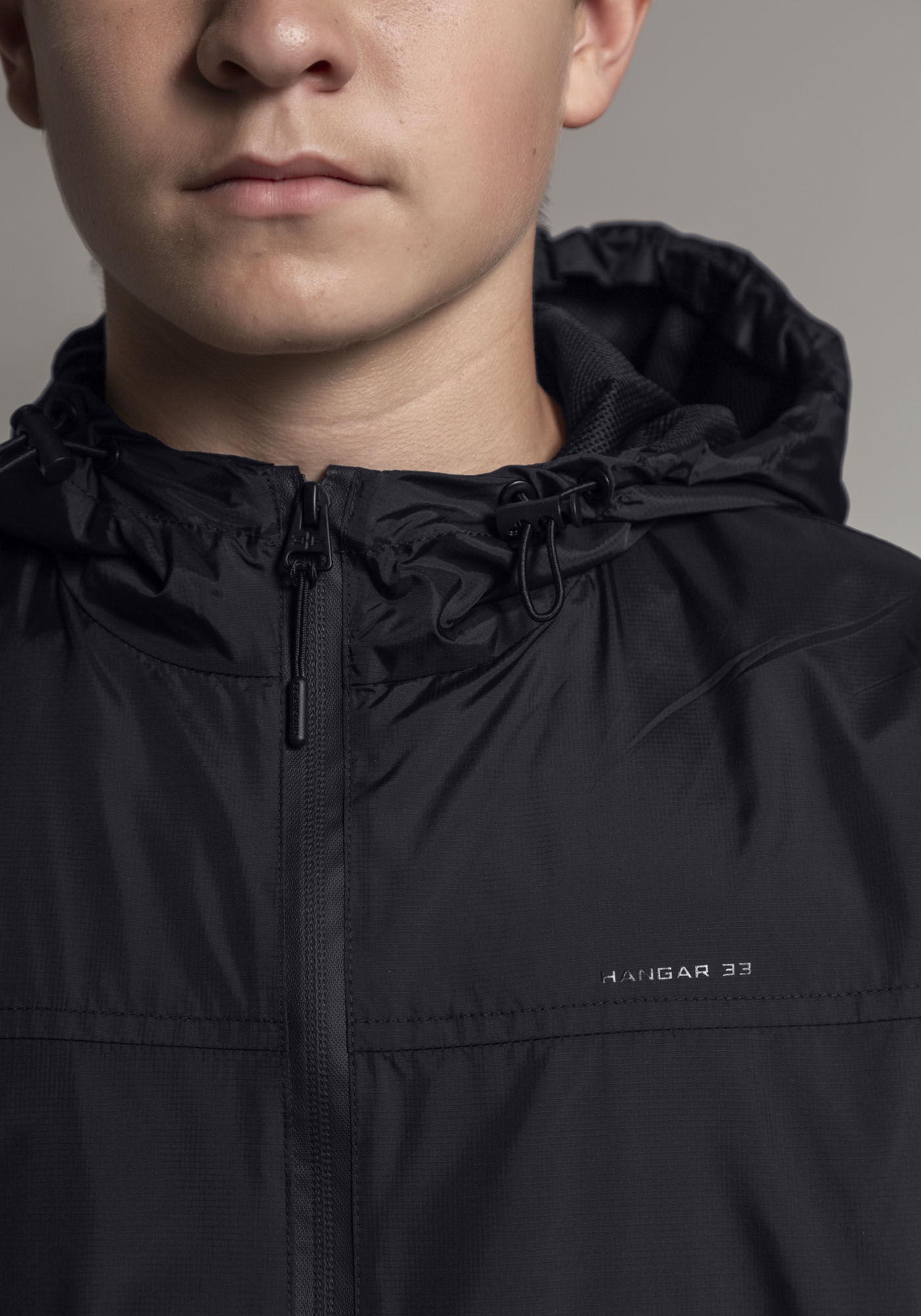 Jaqueta Juvenil Corta Vento com Capuz, PRETO REATIVO, large.